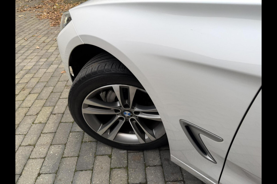 BMW 3-serie Gran Turismo 320i High Executive Automaat | Leer | Stoelverwarming | Cruise & climate control | Head-up display | Keyless entry | Trekhaak af