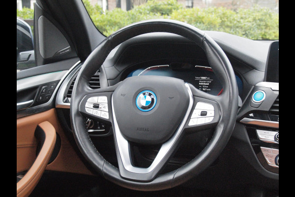 BMW iX3 High Executive 80 kWh | Panoramadak | 360 Camera | Trekhaak | Sfeerverlichting | Head-Up Display | Harman Kardon |