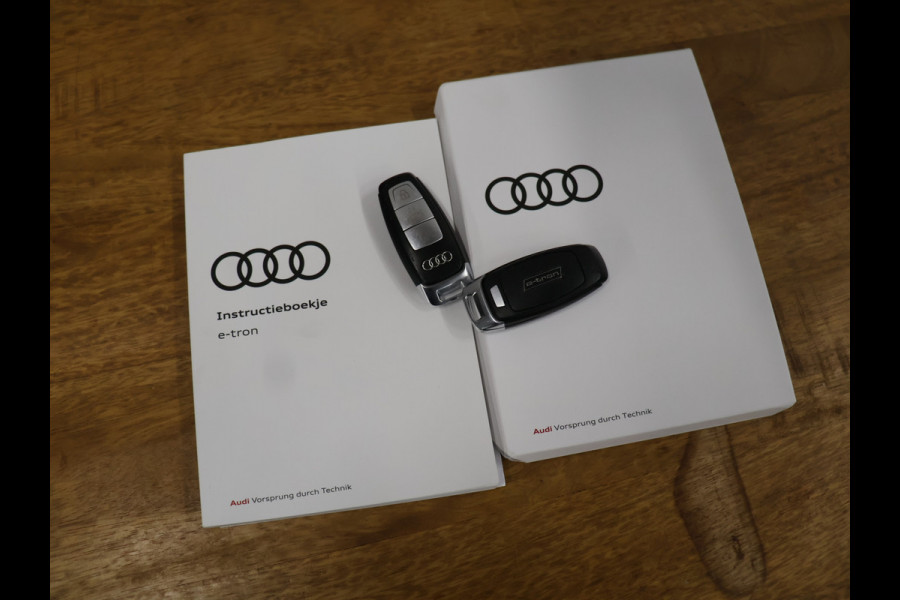 Audi e-tron 55 quattro Business edition Plus 95 kWh [TREKHAAK AFNEEMBAAR, LUCHTVERING, SCHUIFKANTELDAK, MEMORY SEATS, APPLE CARPLAY, ANDROID, SPORTSTOELEN, ADAPTIVE CRUISE, PDC V+A, STOELVERWARMING, NIEUWSTAAT]