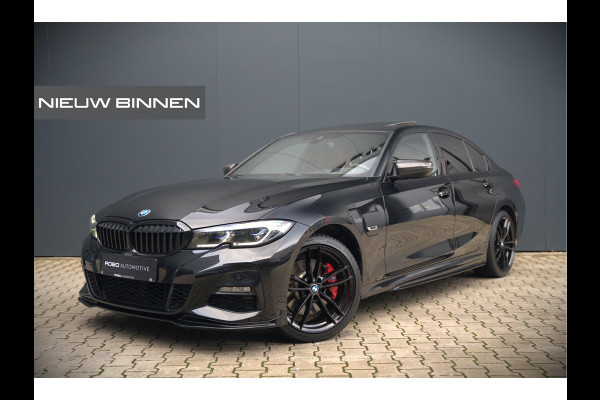 BMW 3-serie 330e xDrive Business Edition Plus M Sport | M Performance | Panoramadak | 360° Camera | Carbon | Head Up Display | Stoelverwarming | Stuurverwarming | Apple Carplay | Navigatie | Cruise Control | Ambiance Verlichting | Trekhaak