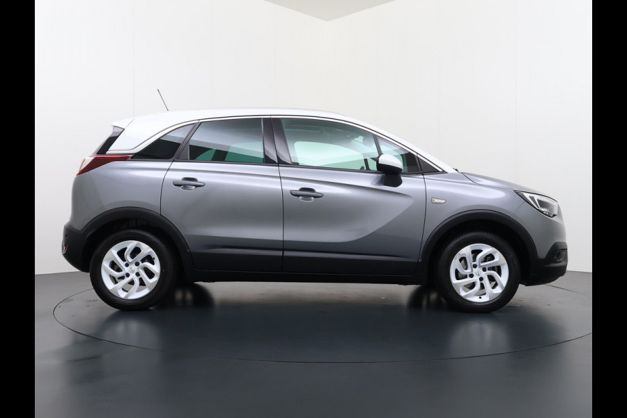 Opel Crossland X T 111PK AUT-6 Pano-Dak Pdc Trekhaak Navi Ecc HUD Apple Carplay Android Auto 360°Camera Bord-Herkenning Head-Up Display Innovatio AGR-Comfort Stoelen Lmv Cruise Control Isofix DAB+ Bluetooth Lane Assist Led Head-Up-Display Super-compleet Origineel Nederlandse Auto Distributieriem is vervangen!