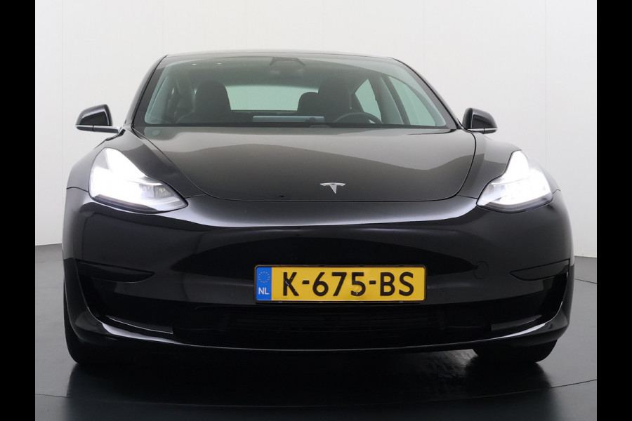 Tesla Model 3 RWD SR+ 325PK Trekhaak Lmv 18" AutoPilot FSD Leder Pano-dak Adaptive-Cruise Camera's Elektr.-Stuur+Stoelen+Spiegels+Geheugen+Eas SOH 92% Navi LED Comfortstoelen ACC DAB Voorverwarmen interieur via App Keyless One-Pedal-Drive 1e Eigenaar Origineel Nederlandse Auto 1.584kg licht!
