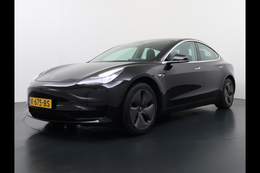 Tesla Model 3 RWD SR+ 325PK Trekhaak Lmv 18" AutoPilot FSD Leder Pano-dak Adaptive-Cruise Camera's Elektr.-Stuur+Stoelen+Spiegels+Geheugen+Eas SOH 92% Navi LED Comfortstoelen ACC DAB Voorverwarmen interieur via App Keyless One-Pedal-Drive 1e Eigenaar Origineel Nederlandse Auto 1.584kg licht!