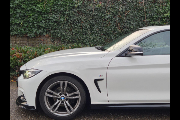 BMW 4 Serie Coupé M Sprt Schuifdak Coupé Apple CarPlay Nap NL High Executive F33 M4 uitlaat Spoiler