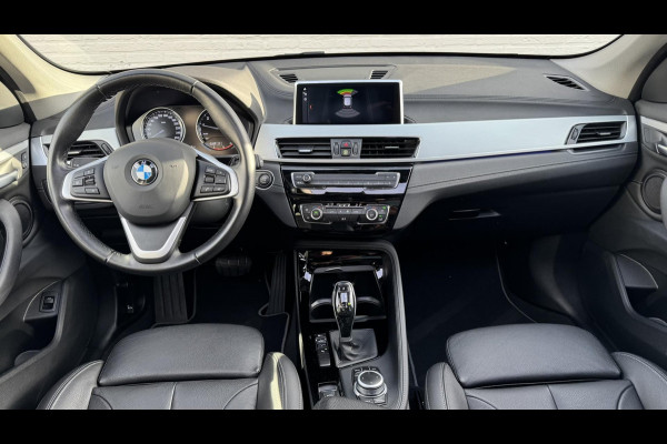 BMW X1 SDrive18i High Executive Cruise Climate control Leer+memory Sfeerverlichting Navigatie Full LED Parkeersensoren