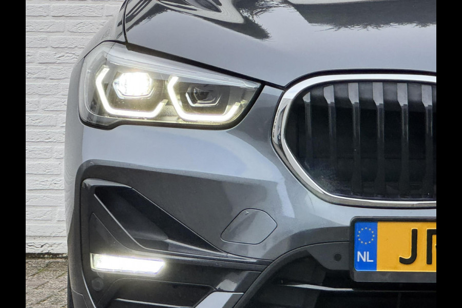 BMW X1 SDrive18i High Executive Cruise Climate control Leer+memory Sfeerverlichting Navigatie Full LED Parkeersensoren