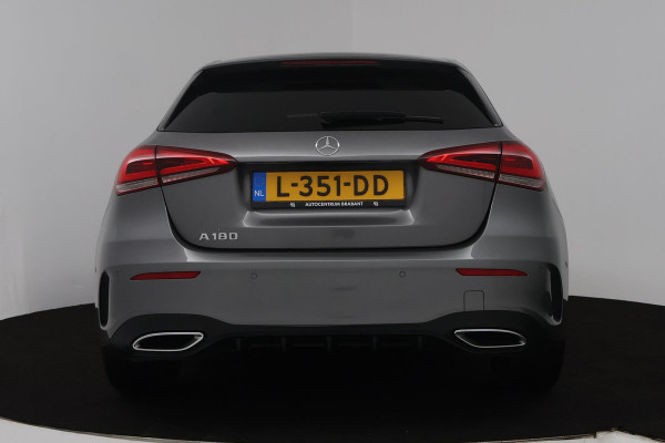 Mercedes-Benz A-Klasse 180 Business Solution AMG (STOELVERWARMING, SFEERVERLICHTING, ACHTERUITRIJCAMERA, CRUISE CONTROL, NAVI)