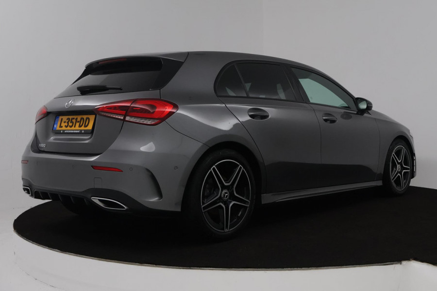 Mercedes-Benz A-Klasse 180 Business Solution AMG (STOELVERWARMING, SFEERVERLICHTING, ACHTERUITRIJCAMERA, CRUISE CONTROL, NAVI)