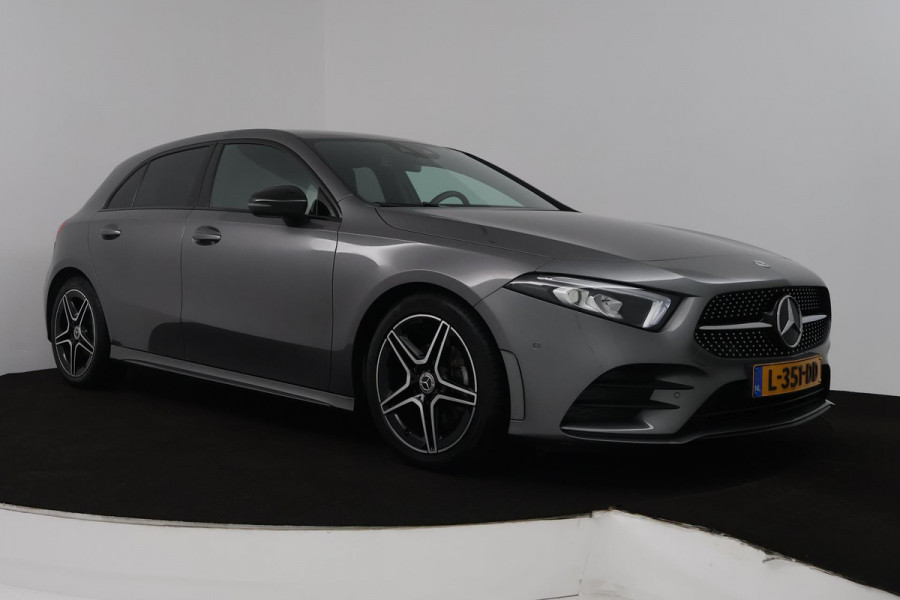 Mercedes-Benz A-Klasse 180 Business Solution AMG (STOELVERWARMING, SFEERVERLICHTING, ACHTERUITRIJCAMERA, CRUISE CONTROL, NAVI)