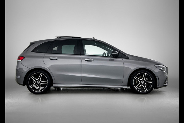 Mercedes-Benz B-Klasse 180 Business Solution AMG Panoramadak | Lichtmetalen velgen | MBUX  wide screen | navigatie | Parking support | Sfeerverlichting | Inclusief 24 maanden MB Certified garantie voor Europa.
