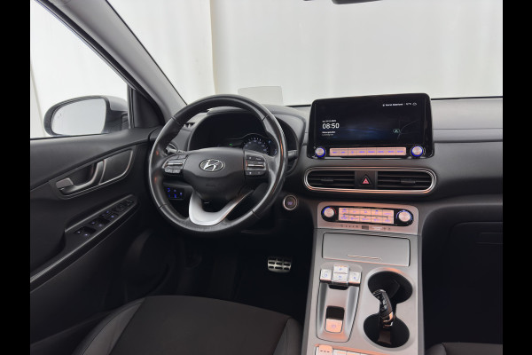 Hyundai Kona EV Fashion 64 kWh (3-Fase) {SOH-100%} (INCL-BTW)  Aut * HEATPUMP | NAVI-FULLMAP | LEATHER-FABRIC | KEYLESS | CAMERA | DAB | ECC | PDC | ADAPTIVE-CRUISE | LANE-ASSIST | HEATED SEATS | PRIVACY-GLASS | HEAD-UP | SHIFT-PADDLES | 17"A