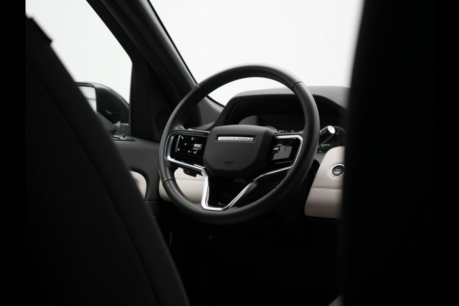 Land Rover Discovery Sport P300e R-Dynamic HSE Plug In Hybrid 309pk Dealer O.H. PHEV | Trekhaak Afn. |  Adaptive Cruise | Camera | Meridian Audio | Alcantara Sportstoelen Memory & Verwarmd | Stuur Verwarmd | Apple Carplay | Keyless | Blis | Navigatie | DAB |