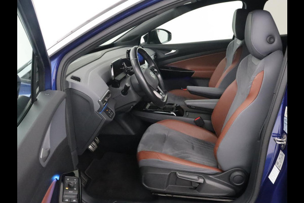 Volkswagen ID.4 First 77 kWh | Stoel & stuurverwarming | Camera | Carplay | Adaptive cruise | Half leder | 20'' | Navigatie | DAB | Sfeerverlichting