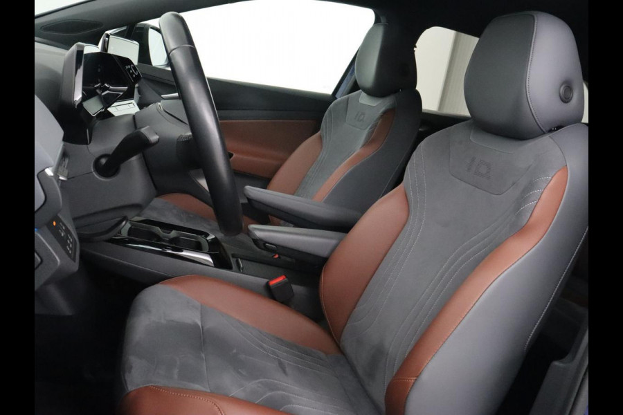 Volkswagen ID.4 First 77 kWh | Stoel & stuurverwarming | Camera | Carplay | Adaptive cruise | Half leder | 20'' | Navigatie | DAB | Sfeerverlichting