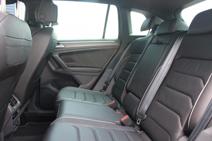 Volkswagen Tiguan 1.4 TSI 245PK eHybrid R-LINE BUSINESS + | BEKLEDING LEDER VIENNA | PANORAMISCH SCHUIF/KANTEL DAK | ELEKTRISCH WEGKLAPENBARE TREKHAAK | R-LINE INTERIEUR/EXTERIEUR | VERWARMBARE VOORSTOELEN/STUUR | ELEKTRISCH BEDIENBARE VOORSTOELEN MET GEHEUGEN FUNCTIE | AKOESTISCH GLAS GETINT | KEYLESS ACCESS/START | ELEKTRISCH BEDIENABRE ACHTERKLEP | DAKSPOILER R-LINE | SFEER VERLICHTING | RIJASSISTENT PAKKET O.A. LANE ASSIST EN ADAPTIVE CRUISE CONTROL EN DODEHOEK DETECTIE | NAVIGATIE | APPLE CARPLAY/ANDROID AUTO | DAB+ RADIO | LED MATRIX KOPLAMPEN (IQ LIGHT) | DRAADLOZE TELEFOONLADER