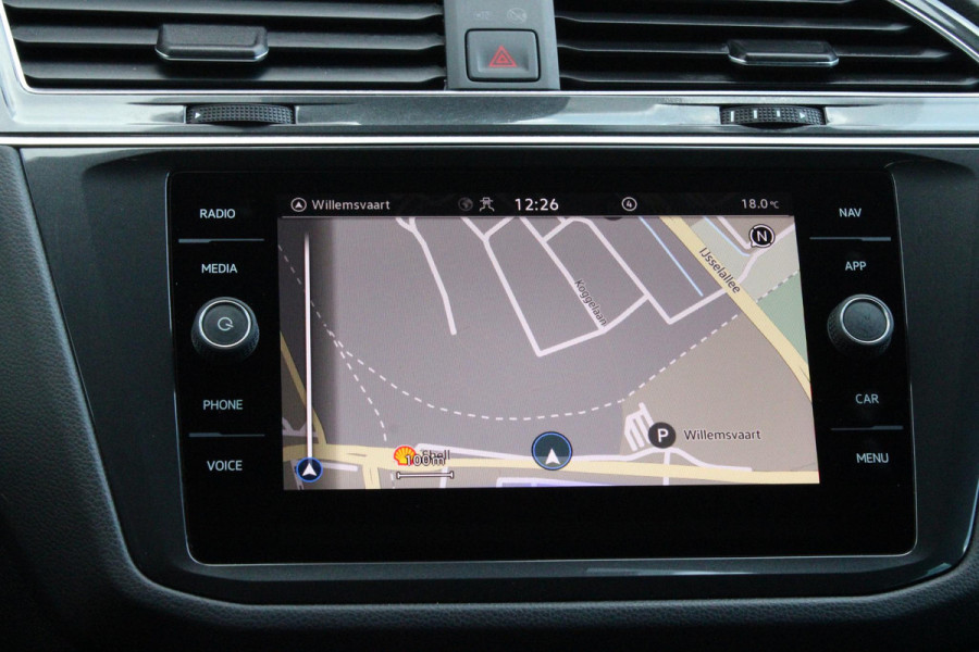 Volkswagen Tiguan 1.4 TSI 245PK eHybrid R-LINE BUSINESS + | BEKLEDING LEDER VIENNA | PANORAMISCH SCHUIF/KANTEL DAK | ELEKTRISCH WEGKLAPENBARE TREKHAAK | R-LINE INTERIEUR/EXTERIEUR | VERWARMBARE VOORSTOELEN/STUUR | ELEKTRISCH BEDIENBARE VOORSTOELEN MET GEHEUGEN FUNCTIE | AKOESTISCH GLAS GETINT | KEYLESS ACCESS/START | ELEKTRISCH BEDIENABRE ACHTERKLEP | DAKSPOILER R-LINE | SFEER VERLICHTING | RIJASSISTENT PAKKET O.A. LANE ASSIST EN ADAPTIVE CRUISE CONTROL EN DODEHOEK DETECTIE | NAVIGATIE | APPLE CARPLAY/ANDROID AUTO | DAB+ RADIO | LED MATRIX KOPLAMPEN (IQ LIGHT) | DRAADLOZE TELEFOONLADER