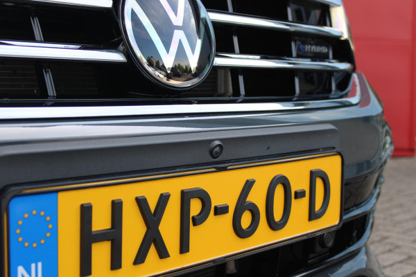 Volkswagen Tiguan 1.4 TSI 245PK eHybrid R-LINE BUSINESS + | BEKLEDING LEDER VIENNA | PANORAMISCH SCHUIF/KANTEL DAK | ELEKTRISCH WEGKLAPENBARE TREKHAAK | R-LINE INTERIEUR/EXTERIEUR | VERWARMBARE VOORSTOELEN/STUUR | ELEKTRISCH BEDIENBARE VOORSTOELEN MET GEHEUGEN FUNCTIE | AKOESTISCH GLAS GETINT | KEYLESS ACCESS/START | ELEKTRISCH BEDIENABRE ACHTERKLEP | DAKSPOILER R-LINE | SFEER VERLICHTING | RIJASSISTENT PAKKET O.A. LANE ASSIST EN ADAPTIVE CRUISE CONTROL EN DODEHOEK DETECTIE | NAVIGATIE | APPLE CARPLAY/ANDROID AUTO | DAB+ RADIO | LED MATRIX KOPLAMPEN (IQ LIGHT) | DRAADLOZE TELEFOONLADER