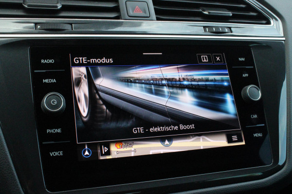 Volkswagen Tiguan 1.4 TSI 245PK eHybrid R-LINE BUSINESS + | BEKLEDING LEDER VIENNA | PANORAMISCH SCHUIF/KANTEL DAK | ELEKTRISCH WEGKLAPENBARE TREKHAAK | R-LINE INTERIEUR/EXTERIEUR | VERWARMBARE VOORSTOELEN/STUUR | ELEKTRISCH BEDIENBARE VOORSTOELEN MET GEHEUGEN FUNCTIE | AKOESTISCH GLAS GETINT | KEYLESS ACCESS/START | ELEKTRISCH BEDIENABRE ACHTERKLEP | DAKSPOILER R-LINE | SFEER VERLICHTING | RIJASSISTENT PAKKET O.A. LANE ASSIST EN ADAPTIVE CRUISE CONTROL EN DODEHOEK DETECTIE | NAVIGATIE | APPLE CARPLAY/ANDROID AUTO | DAB+ RADIO | LED MATRIX KOPLAMPEN (IQ LIGHT) | DRAADLOZE TELEFOONLADER