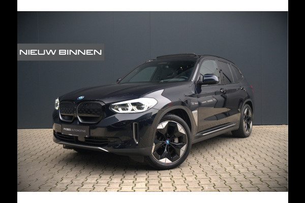 BMW iX3 High Executive 80 kWh | Panoramadak | Keyless | Stoelverwarming | Harman Kardon | Memory Seat | Head-Up Display | 360 Camera | Ambiance Verlichting | Trekhaak | Adaptive LED | Elektrische Stoelen | Apple Carplay |