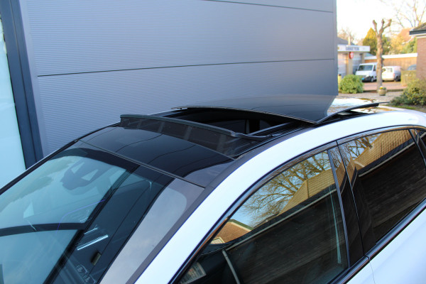 Mercedes-Benz B-Klasse 200 Business Solution AMG | Panoramadak | Trekhaak | Camera | Stoelverwarming | CarPlay