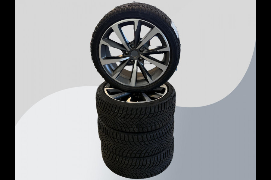 CUPRA Leon Sportstourer 1.4 e-Hybrid Business 204pk PHEV | Achteruitrijcamera | Winterset! | Side-Assist | Navigatie | Climate control |  Stoel- & Stuurverwarming | 18" lichtmetalen velgen |