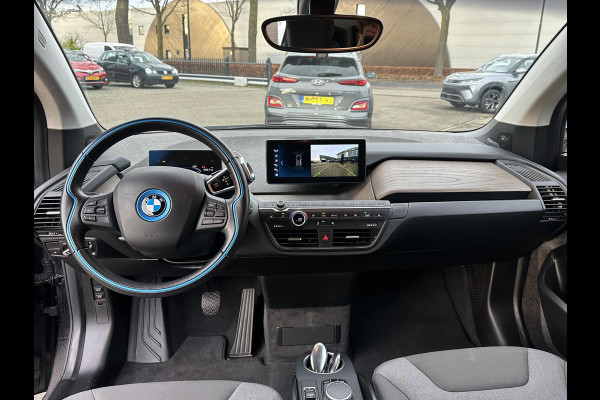 BMW i3 Dark Shadow Edition 120Ah 42 kWh VAN: €21.900,- VOOR: €19.877,- UW EINDEJAARSVOORDEEL: €2.023,- | HARMAN KARDON| ACHTERUITRIJCAMERA| STOELVERWARMING| WARMTEPOMP| COMFORT ACCESS