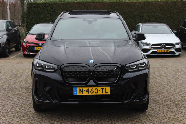 BMW iX3 High Executive 80 kWh / SoH 94.7% / Trekhaak / Panoramadak / 360Camera / Head-up / 20'' / Leder / Harman Kardon / Sfeerverlichting / Dodehoek / DAB / Stuur+Stoelverwarming / ACC