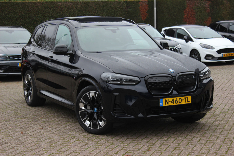 BMW iX3 High Executive 80 kWh / SoH 94.7% / Trekhaak / Panoramadak / 360Camera / Head-up / 20'' / Leder / Harman Kardon / Sfeerverlichting / Dodehoek / DAB / Stuur+Stoelverwarming / ACC
