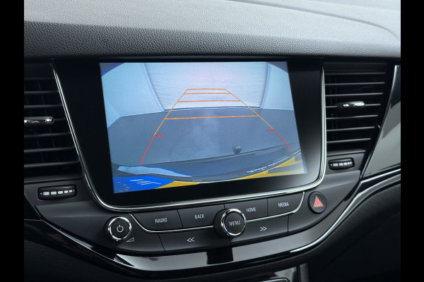 Opel Astra Sports Tourer 1.4 Turbo Trekhaak Navi Ecc Camera Pdc AGR-Comfort Stoel Apple Carplay Android Auto Stuur+Stoelverwarming Lane Assist Led Lmv 17" Regen-Lichtsensor Complete Opel Astra Tourer