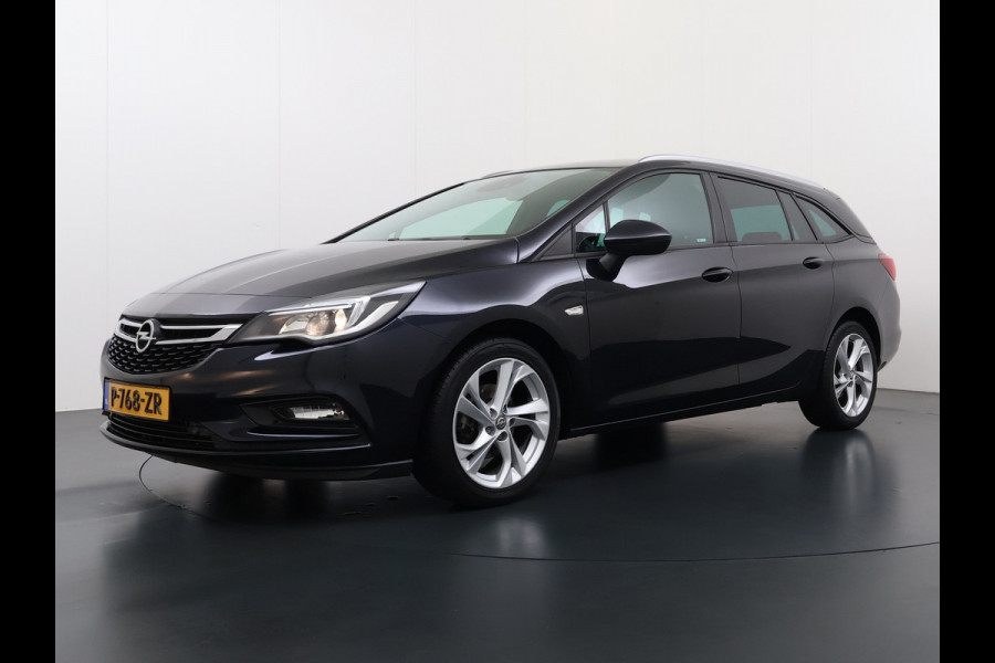 Opel Astra Sports Tourer 1.4 Turbo Trekhaak Navi Ecc Camera Pdc AGR-Comfort Stoel Apple Carplay Android Auto Stuur+Stoelverwarming Lane Assist Led Lmv 17" Regen-Lichtsensor Complete Opel Astra Tourer
