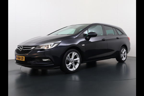 Opel Astra Sports Tourer 1.4 Turbo Trekhaak Navi Ecc Camera Pdc AGR-Comfort Stoel Apple Carplay Android Auto Stuur+Stoelverwarming Lane Assist Led Lmv 17" Regen-Lichtsensor Complete Opel Astra Tourer