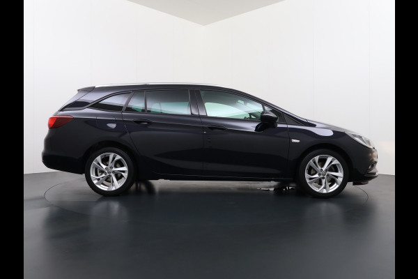 Opel Astra Sports Tourer 1.4 Turbo Trekhaak Navi Ecc Camera Pdc AGR-Comfort Stoel Apple Carplay Android Auto Stuur+Stoelverwarming Lane Assist Led Lmv 17" Regen-Lichtsensor Complete Opel Astra Tourer