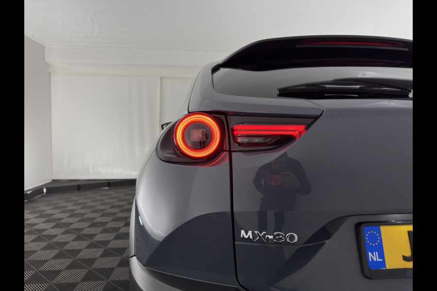 Mazda MX-30 e-SkyActiv 145 First Edition 36 kWh {SOH-92%} (INCL-BTW) Aut.*LEATHER-MICROFIBRE | FULL-LED | NAVI-FULLMAP | KEYLESS | BLIND-SPOT |  ADAPTIVE-CRUISE | HEAD-UP | CAMERA | DIGI-COCKPIT | MEMORY-PACK | SHIFT-PADDLES | 18"ALU*