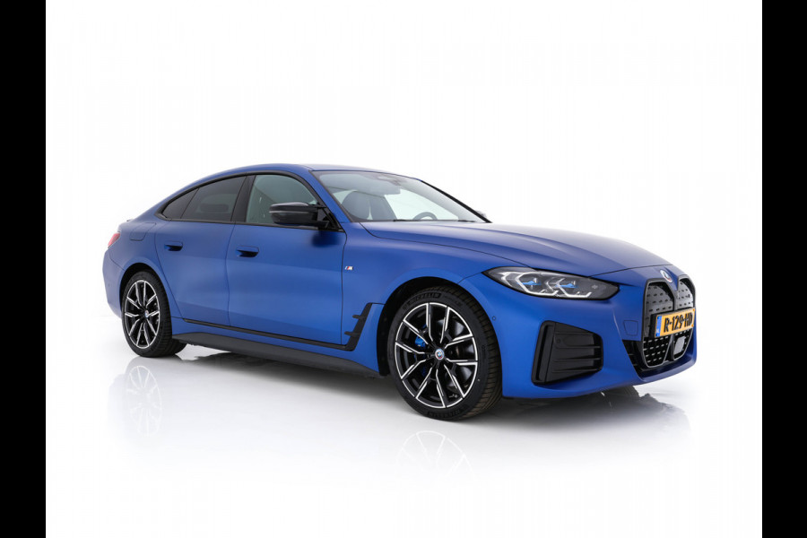 BMW i4 M50 M-Sportpack High Executive 84 kWh [ 3-Fase ] {SOH-97%} (INCL-BTW) *LUXURY-LEATHER | HARMAN/KARDON | ADAPTIVE-CRUISE | HEAD-UP | LASER-LED | BLIND-SPOT | TOP-VIEW | HEATED-SPORTSEATS | DAB+ | WIDE-COCKPIT | AMBIENT-LIGHT | NAVI-FULLMAP | ...