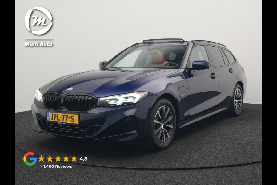 BMW 3 Serie Touring 320e Plug In Hybrid 204pk Dealer O.H. PHEV | Panodak | Widescreen Navi | Camera | Lederen Sportstoelen Verwarmd | Sfeerverlichting | Apple Carplay | Navigatie | Virtual | DAB | Tansanitblau II Metallic |