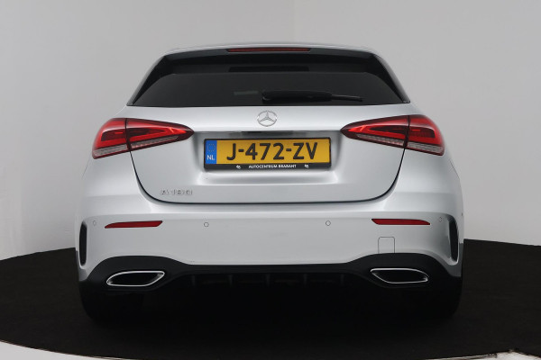 Mercedes-Benz A-Klasse 180 Business Solution AMG (SFEERVERLICHTING, STOELVERWARMING, ACHTERUITRIJCAMERA, NAVIGATIE, SENSOREN)