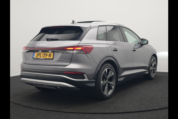 Audi Q4 e-tron 50 quattro S-Line 77 kWh 299pk Dealer O.H. Incl. BTW | Panodak | SOH 93,2% | Lederen Sportstoelen Verwarmd | 20"L.M  | Navigatie | Cruise Control | Virtual | DAB | Taifungrau Metallic |