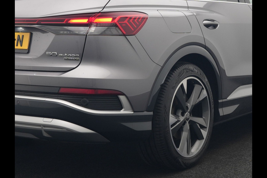 Audi Q4 e-tron 50 quattro S-Line 77 kWh 299pk Dealer O.H. Incl. BTW | Panodak | SOH 93,2% | Lederen Sportstoelen Verwarmd | 20"L.M  | Navigatie | Cruise Control | Virtual | DAB | Taifungrau Metallic |