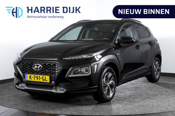 Hyundai Kona 1.6 GDI HEV Comfort - Automaat | Cruise | PDC | Camera | NAV + App. Connect | ECC | Afn. Trekhaak | DAB | LM 16" |