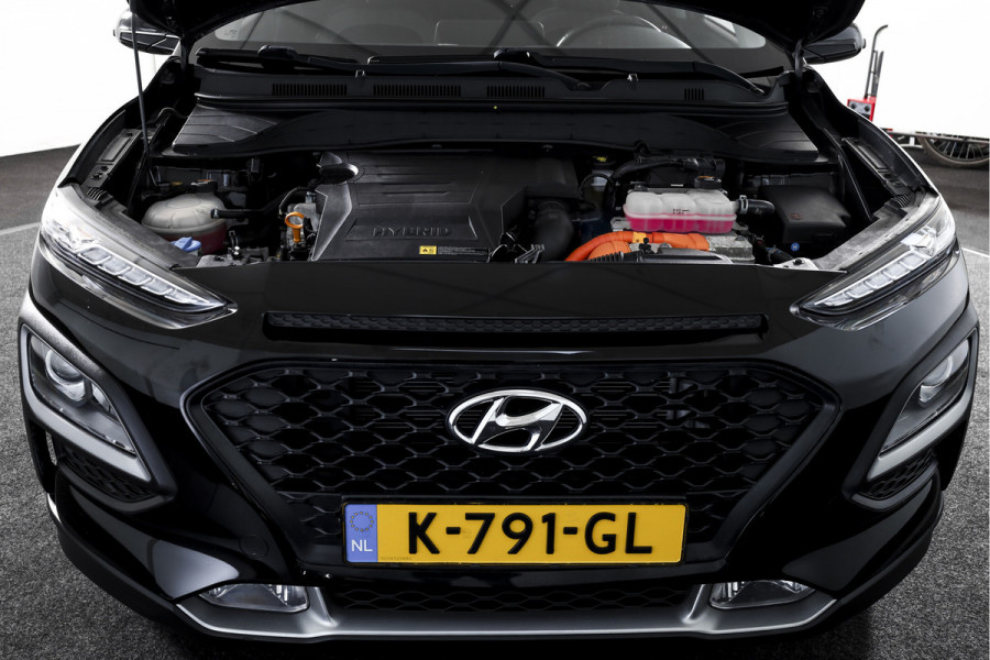 Hyundai Kona 1.6 GDI HEV Comfort - Automaat | Cruise | PDC | Camera | NAV + App. Connect | ECC | Afn. Trekhaak | DAB | LM 16" |
