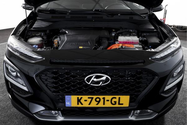 Hyundai Kona 1.6 GDI HEV Comfort - Automaat | Cruise | PDC | Camera | NAV + App. Connect | ECC | Afn. Trekhaak | DAB | LM 16" |