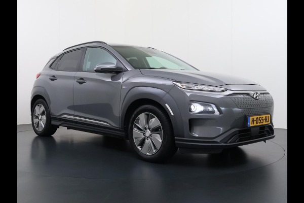 Hyundai Kona EV Premium 64 kWh SKY|VAN: €20.900,- VOOR: €18.877,- UW EINDEJAARSVOORDEEL: €2.023,-|  3-FASE| STOEL + STUURVERWARMING| STOEL VENTILATIE| AFN. TREKHAAK| DODE HOEK | CAMERA| HEAD-UP DISPLAY| PANO|