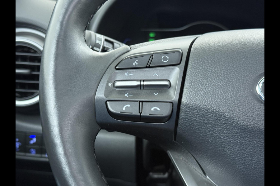 Hyundai Kona EV Premium 64 kWh SKY|VAN: €20.900,- VOOR: €18.877,- UW EINDEJAARSVOORDEEL: €2.023,-|  3-FASE| STOEL + STUURVERWARMING| STOEL VENTILATIE| AFN. TREKHAAK| DODE HOEK | CAMERA| HEAD-UP DISPLAY| PANO|