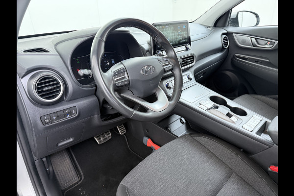Hyundai Kona EV 64kWh Warmtepomp Adap.Cruise Navi Ecc Camera Pdc Trekhaak Krell®-Audio Apple Carplay Android Auto Comfort SOH 100% Lane Assist DAB Led Lmv 17" Regen-Lichtsensor Keyless 1e Eigenaar Origineel Nederlandse Auto