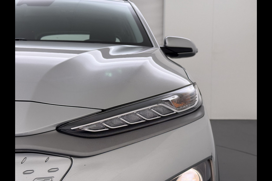 Hyundai Kona EV 64kWh Warmtepomp Adap.Cruise Navi Ecc Camera Pdc Trekhaak Krell®-Audio Apple Carplay Android Auto Comfort SOH 100% Lane Assist DAB Led Lmv 17" Regen-Lichtsensor Keyless 1e Eigenaar Origineel Nederlandse Auto