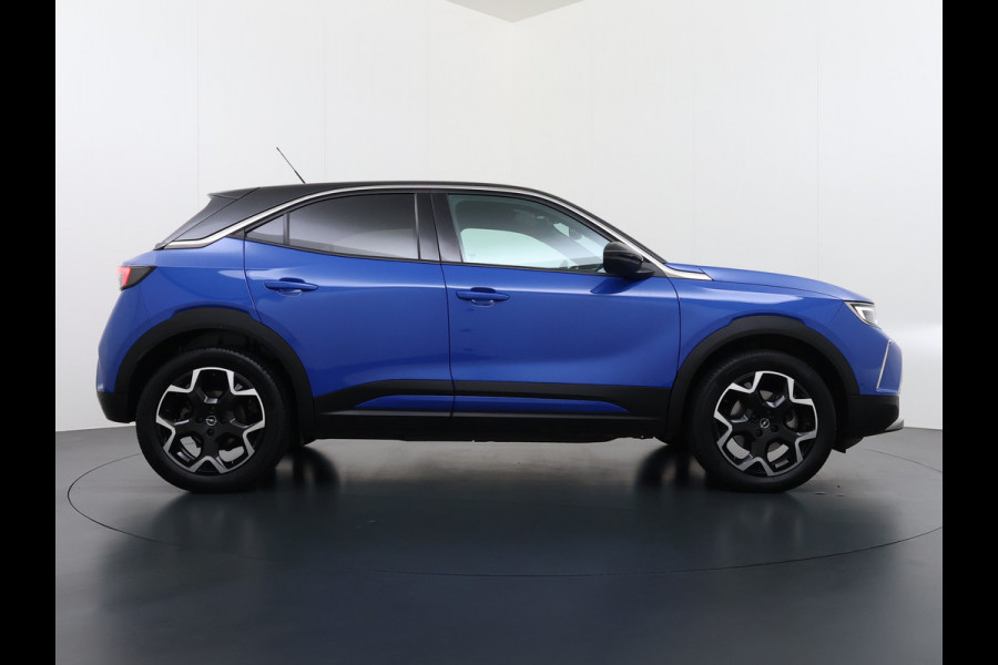 Opel Mokka-e Ultimate 50kWh Leer-Stoel+Massage Adap.Cruise Warmtepomp LED-Matrix Navi Ecc 360°CameraTwo-Tone Lak Apple Carplay Android Auto SOH 91% Keyless Stuur-Stoelverwarming Lmv 18" Lane Assist DAB+ Regen-Lichtsensor Zeer compleet! € 42.000 nieuw! Slechts 1498kg licht!!!
