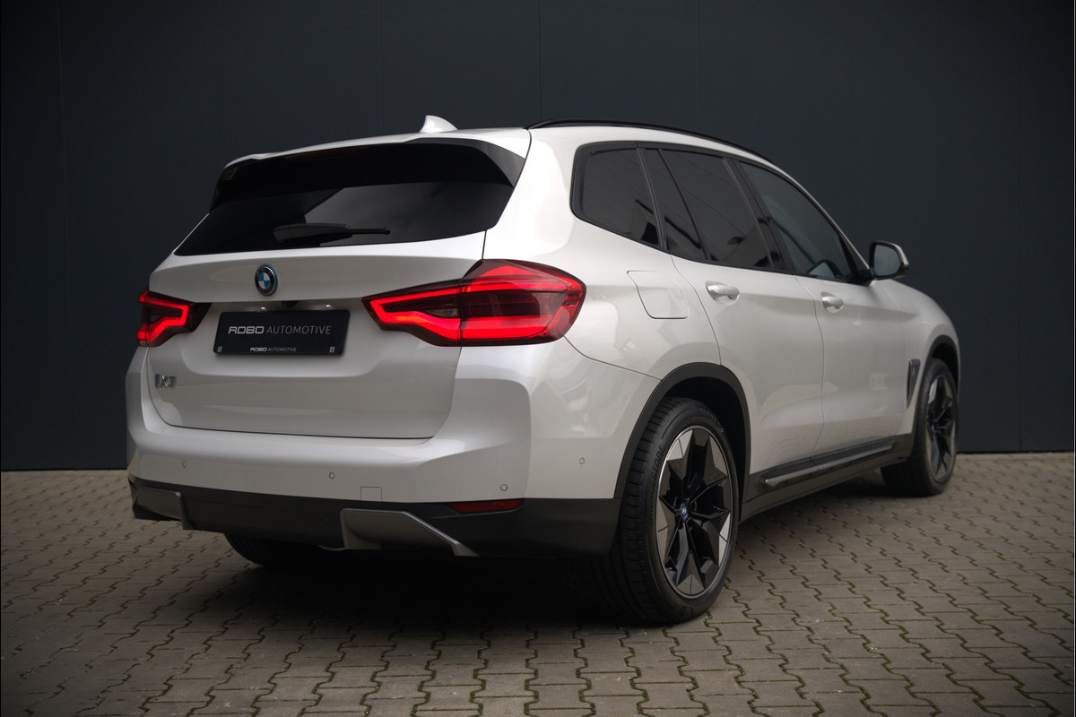 BMW iX3 High Executive 80 kWh | Panoramadak | Keyless | Stoelverwarming | Harman Kardon | Memory Seat | Head-Up Display | 360 Camera | Adaptief Onderstel | Trekhaak | Adaptive LED | Elektrische Stoelen | Apple Carplay | N