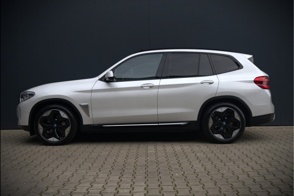 BMW iX3 High Executive 80 kWh | Panoramadak | Keyless | Stoelverwarming | Harman Kardon | Memory Seat | Head-Up Display | 360 Camera | Adaptief Onderstel | Trekhaak | Adaptive LED | Elektrische Stoelen | Apple Carplay | N