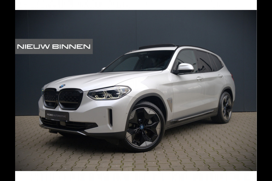 BMW iX3 High Executive 80 kWh | Panoramadak | Keyless | Stoelverwarming | Harman Kardon | Memory Seat | Head-Up Display | 360 Camera | Adaptief Onderstel | Trekhaak | Adaptive LED | Elektrische Stoelen | Apple Carplay | N