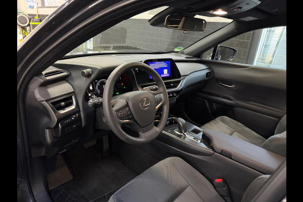 Lexus UX 300e Business Line 73 kWh | 1927KM | Nieuwe Auto | 06-2025 | Camera | Alcantara | SOH 100%